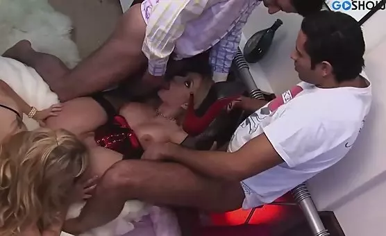 Erotic Couples Exploring StrapOn Anal Play